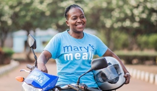 Work for us_Mary's Meals_Woman on Bike