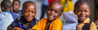 Schoolchildren in Liberia smiling