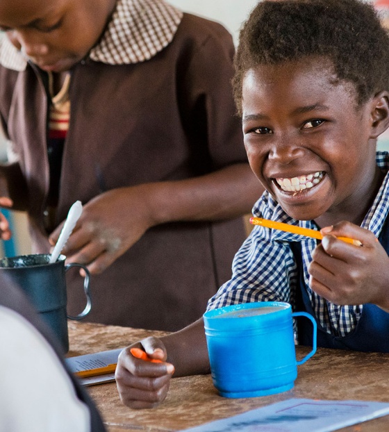 Children in Zambia eating Marys Meals