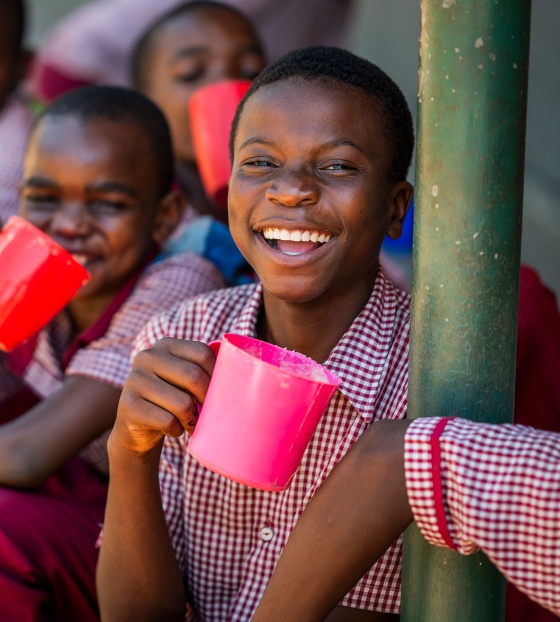 An image of smiling children with their Mary's Meals