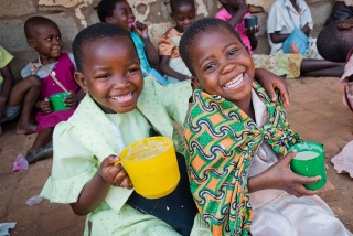 Children in Malawi enjoying Mary's Meals