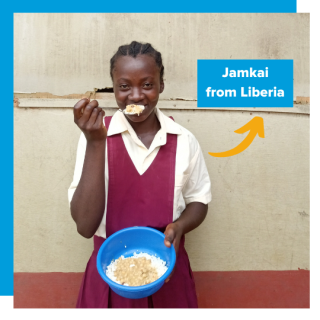 Jamkai with a spoon, eating from a bowl with rice and beans