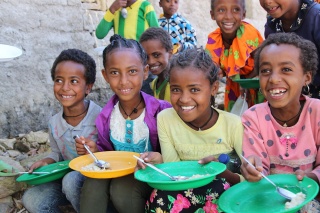 Image of girls with their school meals