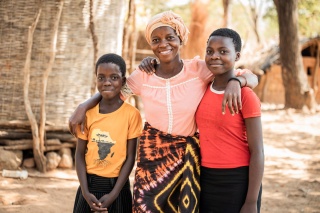 Image of a mother and her two children