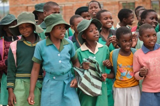 Image of children waiting for thier school meal