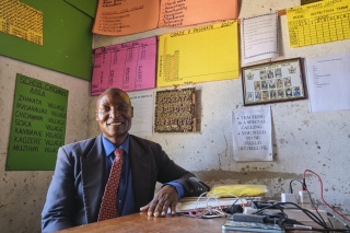 Head teacher, Charles Muchemwa, at his desk