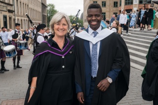 Gift (right), and Emma (right), stand outside the Usher Hall in Edinburgh at his graduation